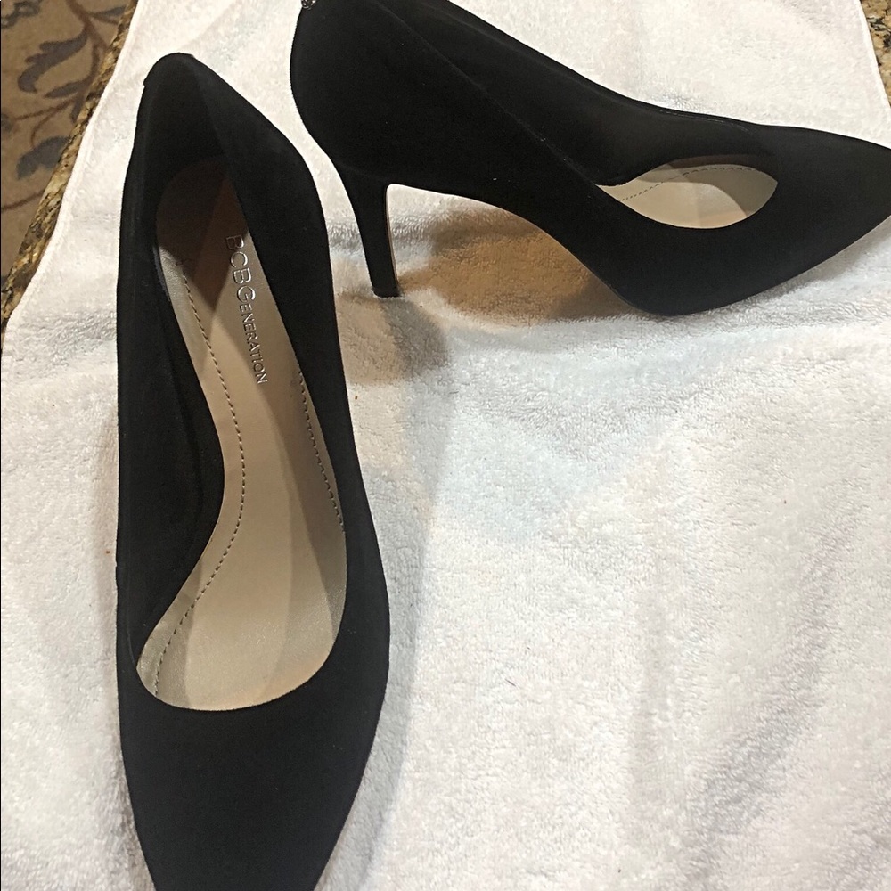 Black suede pumps